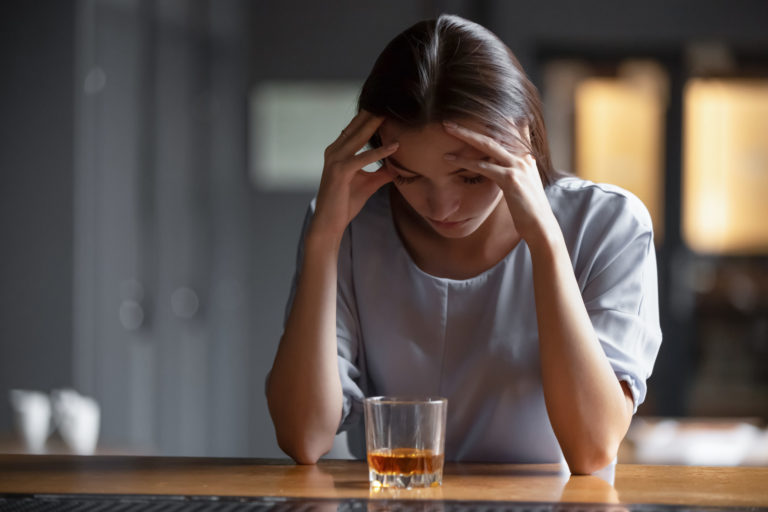 Woman wondering if her alcohol abuse can Cause Depression?